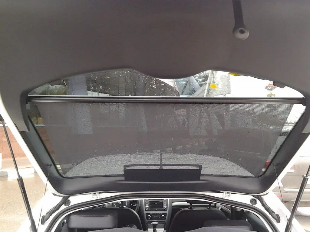 Шторка сонцезахисна ролет на заднє скло Carlife 100 x 57 cм (Сітка Чорна з двох боків) SS100 - фото 5