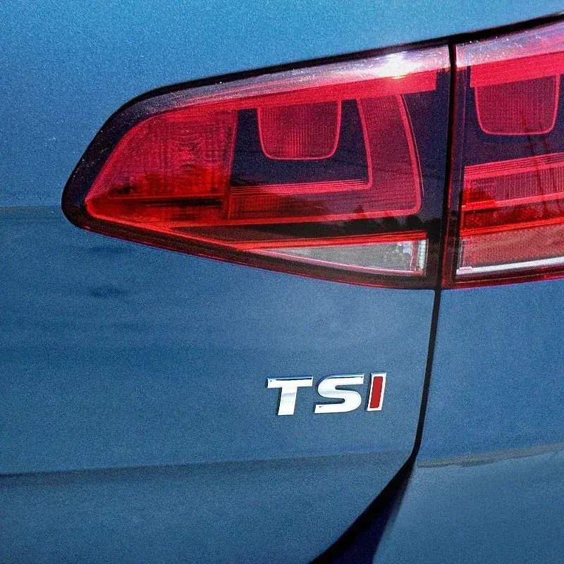 Емблема напис TSI срібло TS I червона 48х15 мм метал (на скотчі) - фото 2