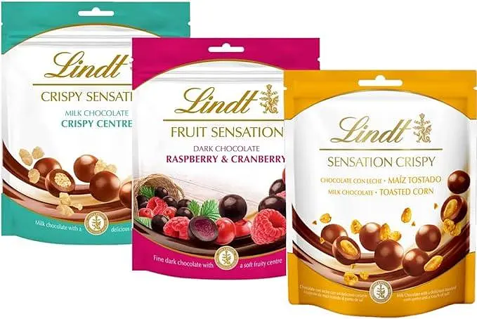 Шоколадні кульки Lindt CRISPY SENSATION Milk Chocolate Crispy Centre Pouch 140г - фото 5