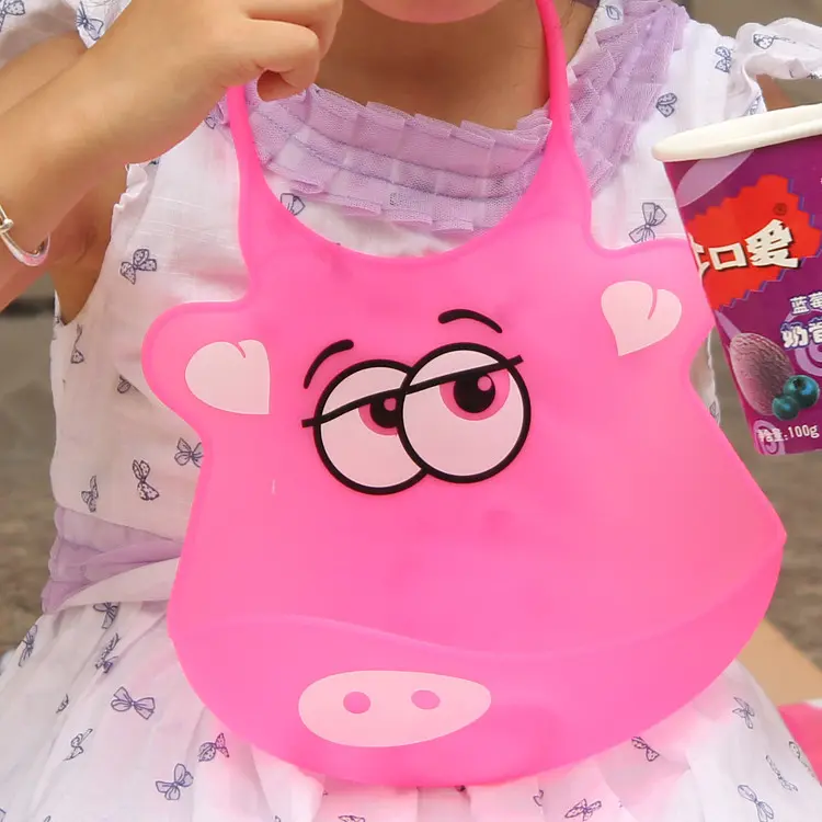 Силіконовий слинявчик з кишенею Kiddy Рожеве порося - фото 2