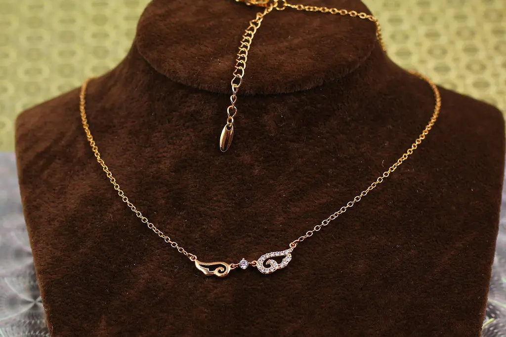 Набір Xuping Jewelry ланцюг із кулоном два крила 45 см добір 5 см золотистий