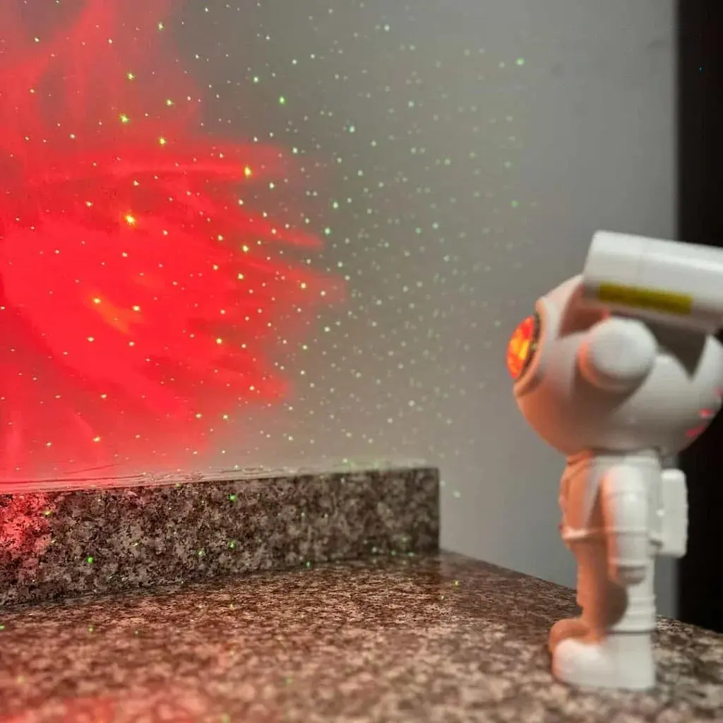 Лазерний нічник-проектор зоряного неба з bluetooth динаміком Astronaut projector light XL-818 білий - фото 6
