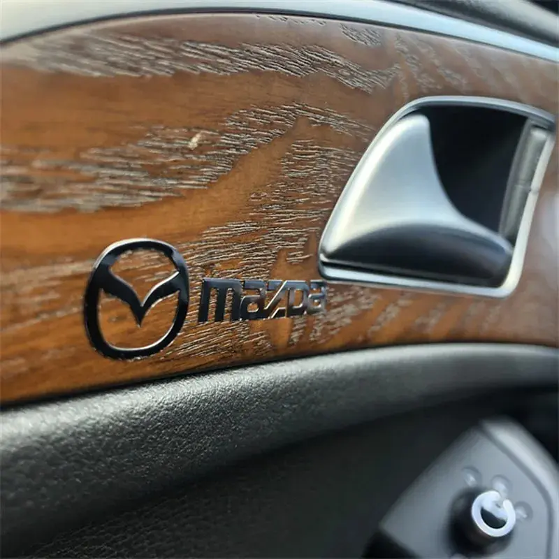 Наклейка з логотипом Mazda метал, на клейкій стрічці 45 x 9 мм 1 шт (універсальна) - фото 5