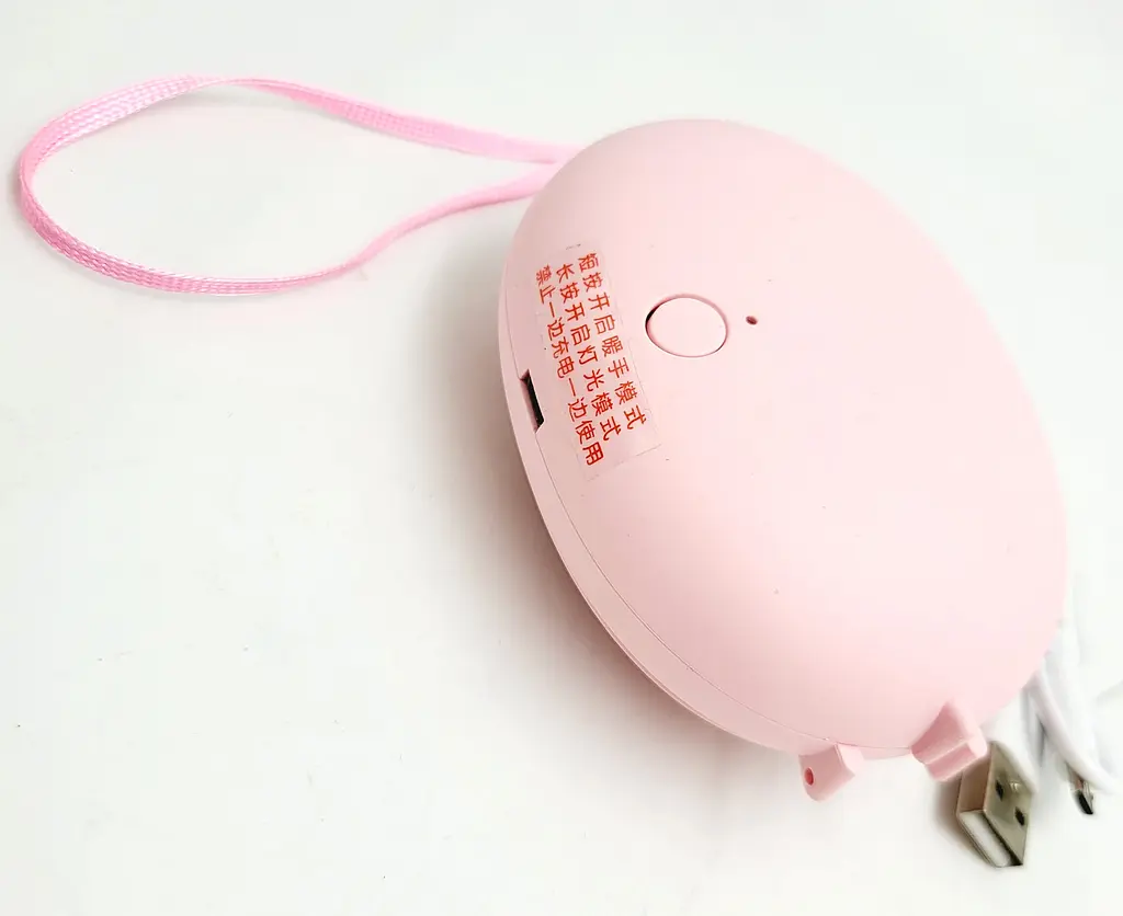 Кишенькова акумуляторна грілка обігрівач для рук нагрівач з USB зарядкою UKC AA21-1 рожевий - фото 3