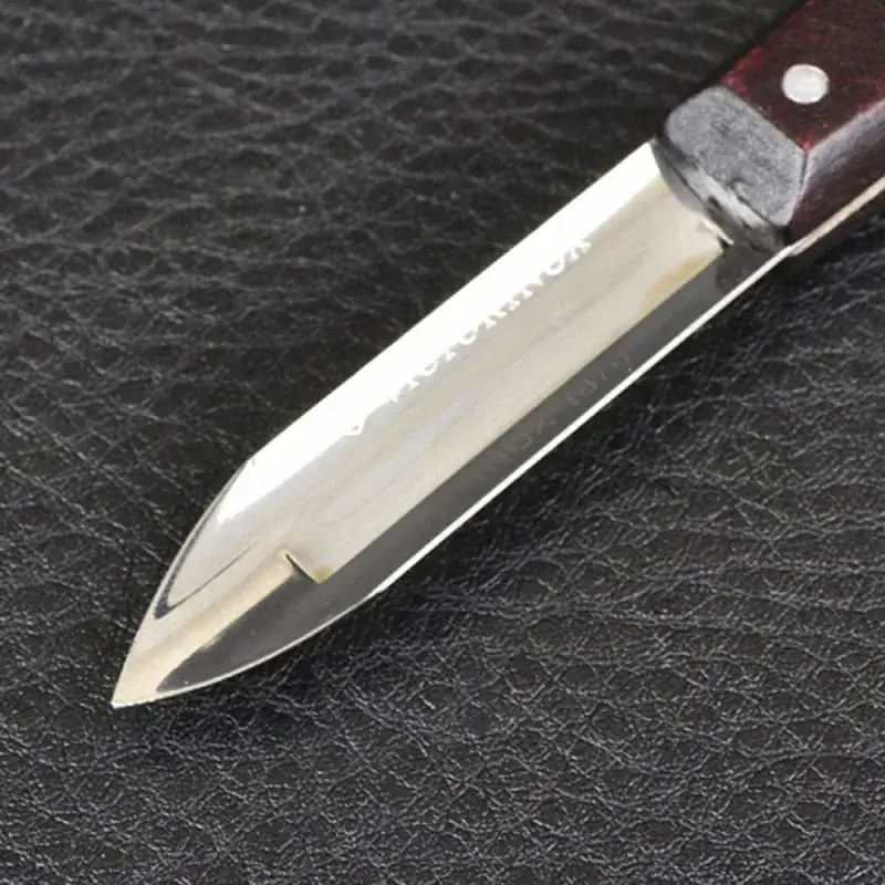 Овочечистка Victorinox з дерев. ручкою (1 лезо) - фото 2