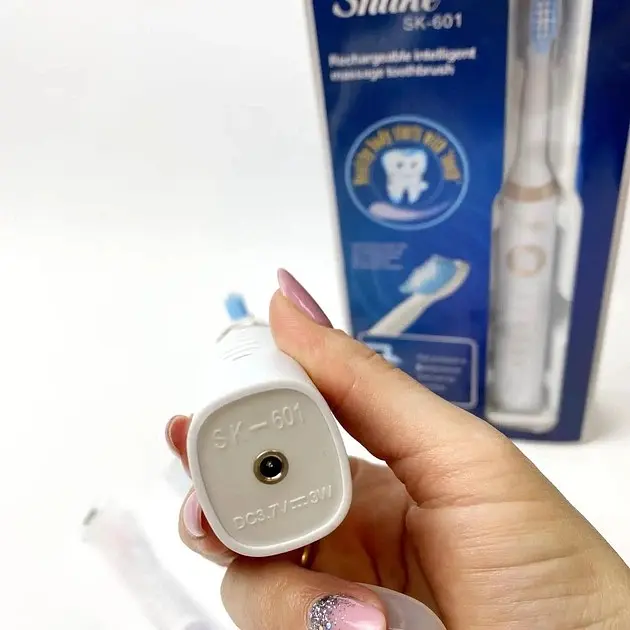 Електрична звукова зубна щітка Shuke SK-601 з 5 режимами роботи + 4 насадки - фото 5