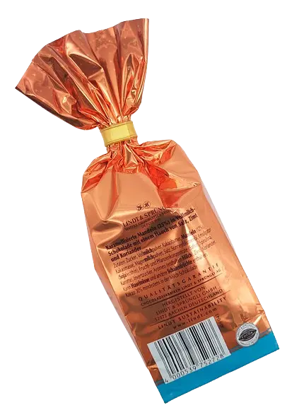 Шоколадні цукерки з мигдалем Lindt Weihnachts Mandeln Caramel Salz 100г - фото 3