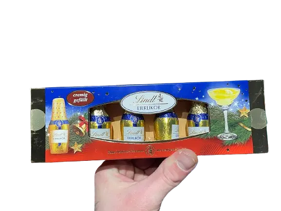 Шоколадні цукерки з лікером Lindt Eierlikör Fläschchen 131г - фото 5