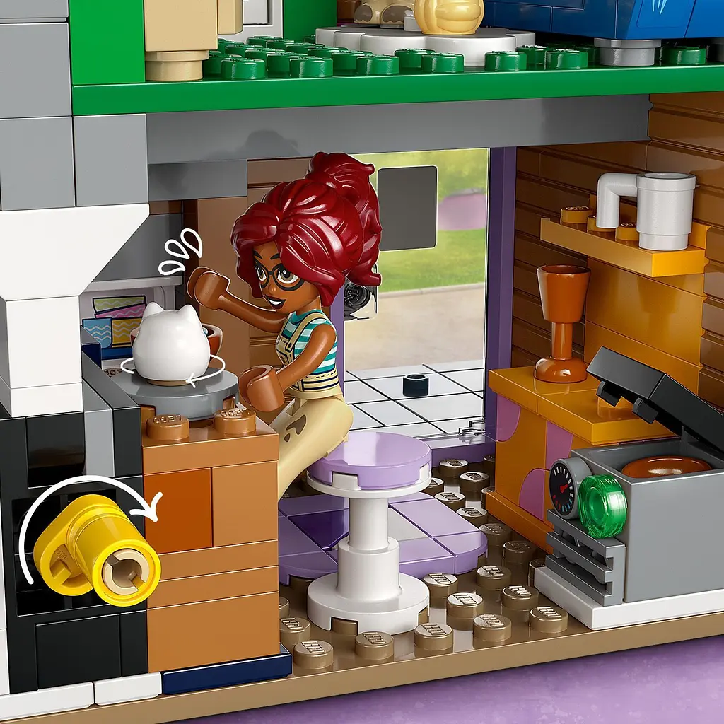 Конструктор LEGO Friends Хартлейк-Сіті. Квартири та крамниці 2040 деталей (42670) - фото 8