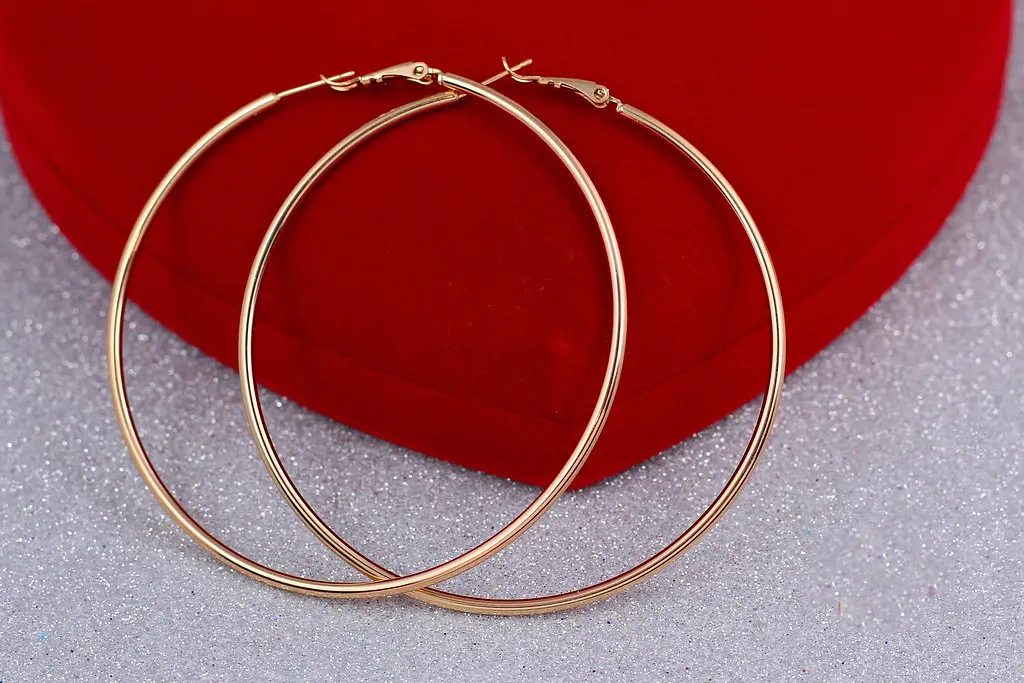 Сережки кільця Хuping Jewelry гладкі 7 см золотисті