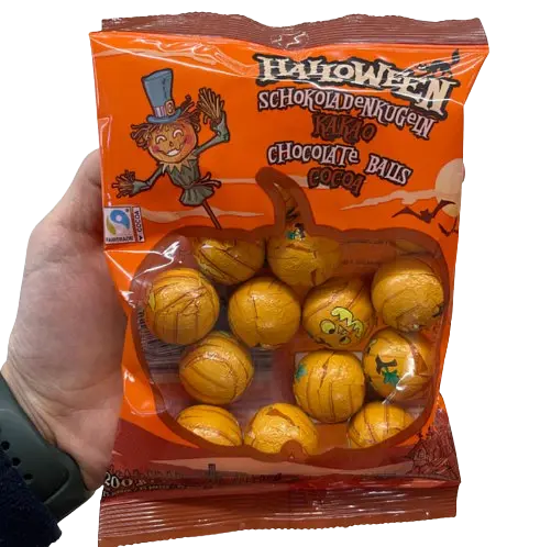 Шоколадні цукерки Halloween Pumpkin Milk Chocolate Balls 200г - фото 5