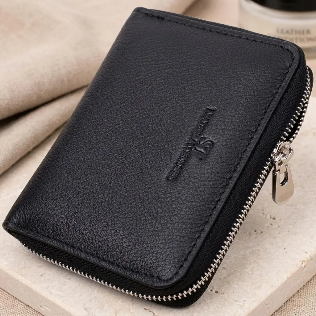 Шкіряний гаманець для жінок на блискавці з тисненим логотипом ST Leather 19489 чорний - фото 11