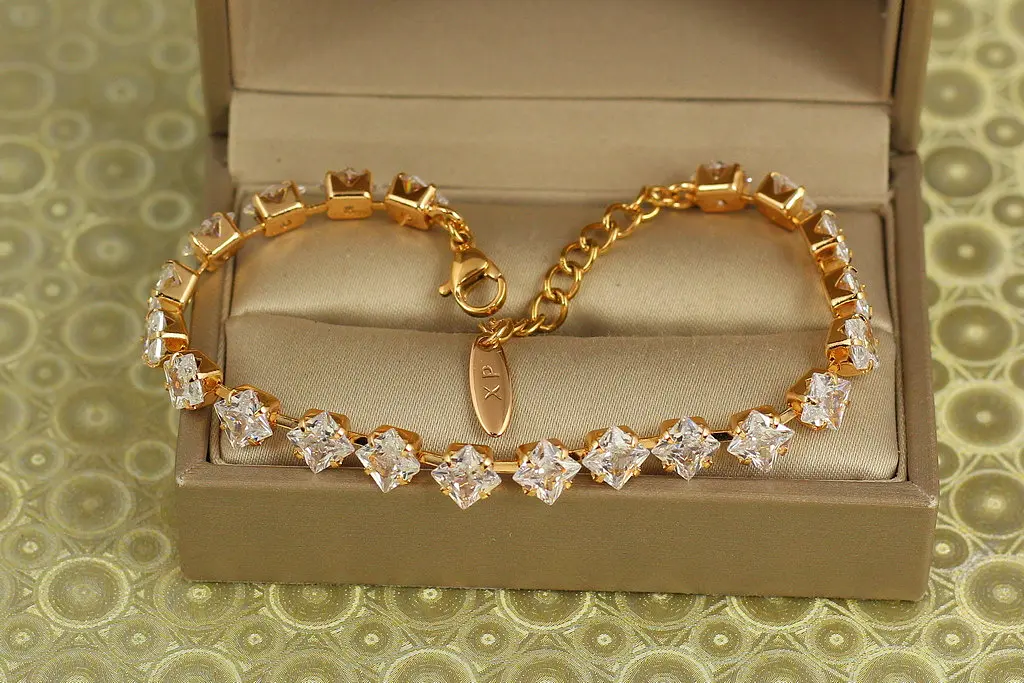 Браслет Xuping Jewelry Льодяні ромби з білими каменями 17 см золотистий