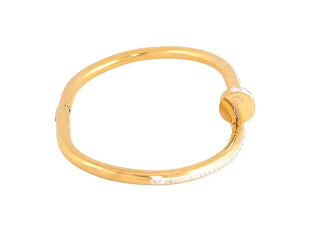 Браслет XUPING Нержавіюча сталь 14К "Цвях з написом Cartier та кристаллами" ø6см (350357) - фото 2