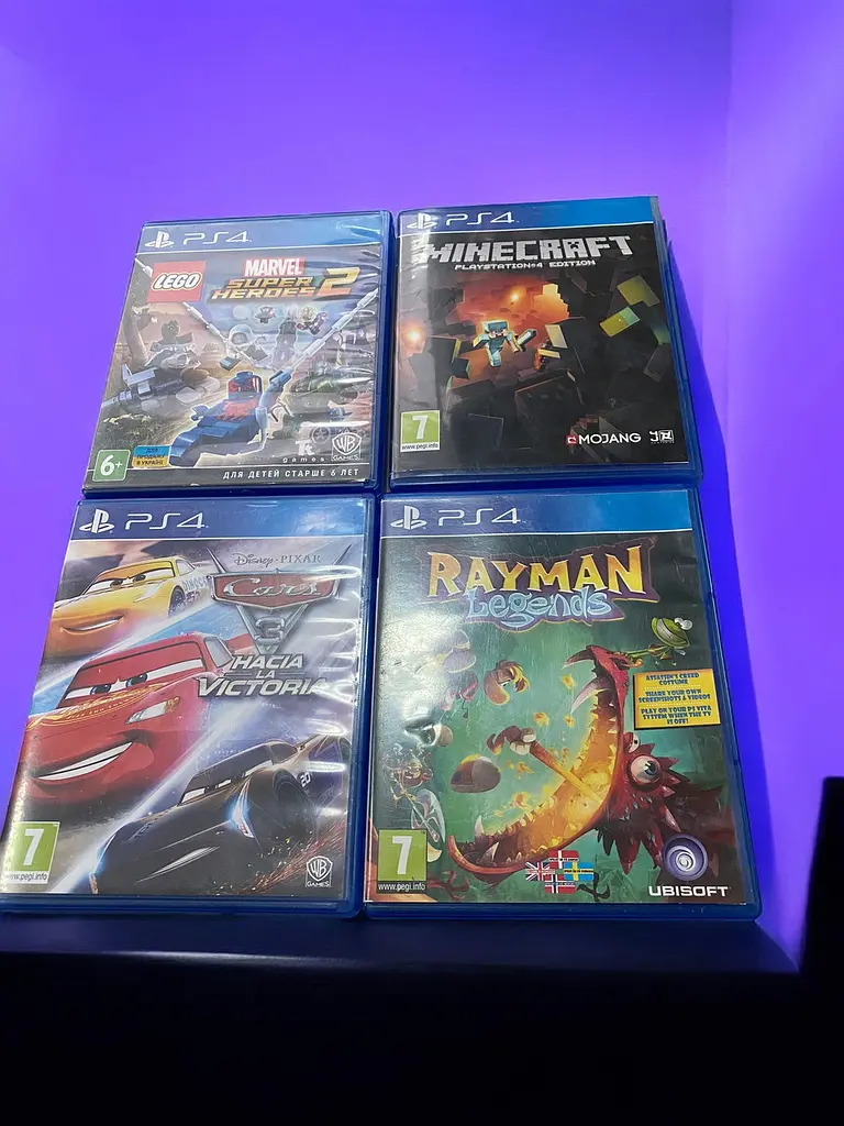Стационарная игровая консоль PlayStation 4 Slim + 4 детские игры - фото 4