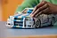 Конструктор LEGO Technic Двойной форсаж Автомобиль Nissan Skyline GT-R (R34) 1410 деталей (42210) - миниатюра 11