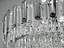 Шикарна кругла кришталева люстра на 18 ламп, срібного кольору - мініатюра 4