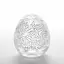 Мастурбатор яйцо Tenga Egg Keith Haring Party белый - миниатюра 2