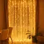 Новорічна гірлянда кімнатна штора Garlando D600LED3MY 3х3 м 600 LED Хвойна лапа Жовте світло  - мініатюра 1