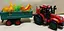 Іграшковий пластиковий трактор з причепом та тваринами Farm Tractor Hot power (077871) Червоний із зеленим - мініатюра 4