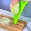Ручна пластикова шинковка для капусти та нарізки овочів та фруктів з плаваючим лезом (34х14.5 см), Kitchette Салатовий 85424 - мініатюра 6