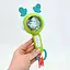 Интерактивная погремушка M 608 со звуками, мелодиями и светом, зеленого цвета - миниатюра 1